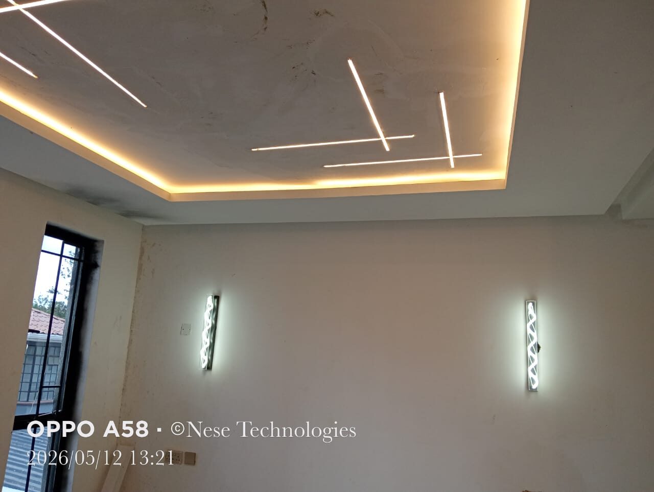 Modern ceiling lighting installation completed by NESE Technologies